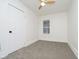 Bright bedroom with neutral walls, plush carpet, and large window for natural light at 3370 N New Jersey St, Indianapolis, IN 46205