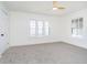 Empty bedroom features neutral walls, plush carpet, and natural light at 3370 N New Jersey St, Indianapolis, IN 46205