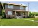 Charming two-story brick home featuring a classic design and well-maintained lawn at 3370 N New Jersey St, Indianapolis, IN 46205