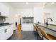 Modern kitchen features stainless steel appliances, sleek countertops, and stylish island seating at 3370 N New Jersey St, Indianapolis, IN 46205