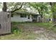 Quaint home with trees around it, situated on a large lot, complete with a classic wood fence at 338 E Park St, Westfield, IN 46074