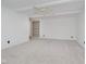 Spacious living room featuring built-in shelving and a ceiling fan at 3698 E 106Th St, Carmel, IN 46033