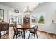 Charming dining room featuring hardwood floors and bright natural light at 4134 Bella Ct, Indianapolis, IN 46237