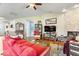 Comfortable living room with hardwood floors, ceiling fan and large windows at 4134 Bella Ct, Indianapolis, IN 46237