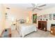 Bright bedroom featuring a ceiling fan, comfortable bed, and natural light from a window at 436 Maria Dr, Greenwood, IN 46143