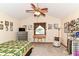 Comfortable bedroom with vaulted ceiling includes carpet flooring, a ceiling fan, and natural light at 436 Maria Dr, Greenwood, IN 46143