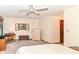 Serene bedroom with a ceiling fan, desk area, and plush carpeting for ultimate comfort and relaxation at 436 Maria Dr, Greenwood, IN 46143
