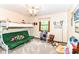 Cheerful bedroom with bunk beds, stuffed animals, and carpet flooring at 436 Maria Dr, Greenwood, IN 46143