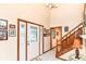 Bright foyer with a decorative front door, tiled floors and staircase at 436 Maria Dr, Greenwood, IN 46143