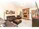 Spacious living room showcasing a brick fireplace, plush seating, and an inviting atmosphere at 436 Maria Dr, Greenwood, IN 46143