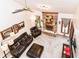 Spacious living room features a brick fireplace, plush seating and neutral carpet at 436 Maria Dr, Greenwood, IN 46143