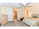 Serene main bedroom with a ceiling fan and ensuite bathroom at 436 Maria Dr, Greenwood, IN 46143