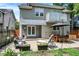 Backyard patio with string lights and outdoor seating, perfect for relaxing and entertaining guests at 4527 Central Ave, Indianapolis, IN 46205