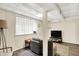 Finished basement offers vinyl plank flooring, recessed lighting, and a cozy atmosphere at 4527 Central Ave, Indianapolis, IN 46205