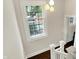 Hallway with window and light fixtures at 4527 Central Ave, Indianapolis, IN 46205