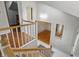 Hallway offers natural light and easy access to other areas of the house with hardwood flooring at 5129 E 69Th St, Indianapolis, IN 46220