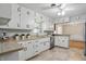 This eat-in kitchen features plenty of counter space, cabinets and a stainless steel dishwasher and dual basin sink at 5129 E 69Th St, Indianapolis, IN 46220
