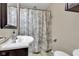 Well-maintained bathroom with a stylish vanity, coordinated decor, and essential fixtures at 518 N Carr Rd, Plainfield, IN 46168