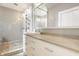 Bright bathroom featuring an oversized shower, large vanity with lots of storage, and modern fixtures at 5219 N New Jersey St, Indianapolis, IN 46220