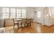 Bright dining room with large windows and a stylish table with chairs at 5219 N New Jersey St, Indianapolis, IN 46220