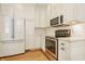 Efficient kitchen featuring modern appliances and ample cabinet space at 5219 N New Jersey St, Indianapolis, IN 46220
