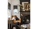 Close-up on a living room with luxurious leather chair and sophisticated black fireplace at 5280 N Capitol Ave, Indianapolis, IN 46208