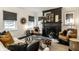 Bright living room featuring a striking fireplace, plush seating, and stylish decor at 5280 N Capitol Ave, Indianapolis, IN 46208