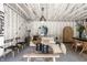 Unique living room showcasing a white wood paneled design with stylish decor and ample natural light at 5280 N Capitol Ave, Indianapolis, IN 46208
