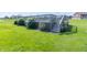 A spacious backyard deck with stairs overlooks a lush green lawn at 5457 W 900 North, McCordsville, IN 46055