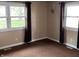 Bright bedroom with carpet, natural light from two windows, and wall to wall blinds for privacy at 5457 W 900 North, McCordsville, IN 46055