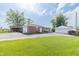 A charming brick home with a detached garage and well-manicured lawn at 5457 W 900 North, McCordsville, IN 46055