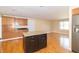 Spacious kitchen featuring a center island and stainless steel refrigerator at 5457 W 900 North, McCordsville, IN 46055