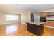 Modern kitchen features an island, stainless appliances, ample counter space and plenty of natural light at 5457 W 900 North, McCordsville, IN 46055
