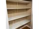 Walk-in pantry with ample storage space featuring rows of white shelving for organization at 5457 W 900 North, McCordsville, IN 46055