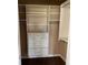This walk-in closet features built in shelving, drawers and hanging racks for organized storage at 5457 W 900 North, McCordsville, IN 46055