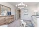 Bright Bedroom featuring a crib, neutral decor, stylish lighting, and playful decorations at 591 Dalton Way, Avon, IN 46123