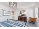 Bright bedroom with a black metal bed frame, modern decor, stylish lighting, and a warm aesthetic at 591 Dalton Way, Avon, IN 46123