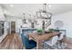 Spacious dining area adjacent to kitchen features modern lighting and stylish decor at 591 Dalton Way, Avon, IN 46123