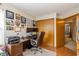 Comfortable home office featuring desk, leather chair, and hardwood floors at 6138 Bartley Ct, Indianapolis, IN 46236