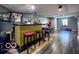Finished basement featuring a bar and seating, perfect for entertaining at 6155 W Bayfront, McCordsville, IN 46055