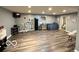 Finished basement features wood-look floors, an egress window, and a separate bathroom at 6155 W Bayfront, McCordsville, IN 46055