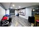 Finished basement featuring a movie theatre, laminate wood floor, and large screen at 6155 W Bayfront, McCordsville, IN 46055