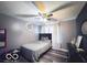 Comfortable bedroom offers ceiling fan, wood floor, and neutral paint at 6155 W Bayfront, McCordsville, IN 46055