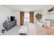 Comfortable bedroom featuring a plush bed, soft lighting, and a large window at 6460 Wasco Dr, Whitestown, IN 46075