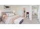 Inviting bedroom with a comfortable bed, soft colors, and a walk-in closet at 6460 Wasco Dr, Whitestown, IN 46075