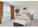 Serene bedroom featuring a plush bed, soft lighting, and a cozy bench at 6460 Wasco Dr, Whitestown, IN 46075