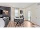 Cozy dining area with modern decor, a round table, and a decorative accent wall at 6460 Wasco Dr, Whitestown, IN 46075