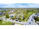 Aerial view of community with pool, clubhouse, and surrounding neighborhood at 6648 Westminster Dr, Zionsville, IN 46077