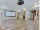 Basement featuring a projector screen, recessed lighting, and stair access at 6648 Westminster Dr, Zionsville, IN 46077