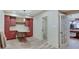 Finished basement with a custom built-in desk area and decorative lighting, perfect for a home office or study space at 6648 Westminster Dr, Zionsville, IN 46077